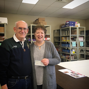 Monroeville Foundation Presents check to local food pantries